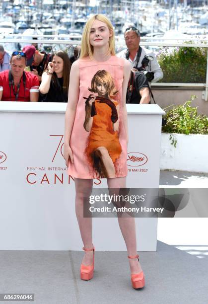 Elle Fanning attends the "How To Talk To Girls At Parties" Photocall during the 70th annual Cannes Film Festival at Palais des Festivals on May 21,...