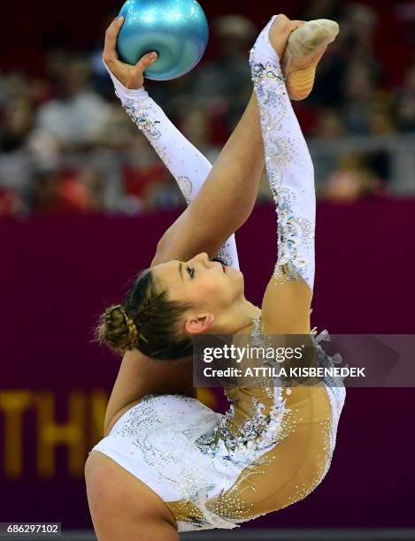 Silver medalist Russia's Aleksandra Soldatova performs with her ball performs during the 33rd Rhythmic Gymnastics European championships in Budapest,...