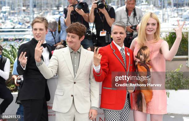 Lewis, Alex Sharp, John Cameron, Elle Fanning attend the "How To Talk To Girls At Parties" Photocall during the 70th annual Cannes Film Festival at...