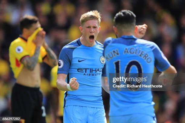 Sergio Aguero of Manchester City celebrates scoring his sides second goal with Kevin De Bruyne of Manchester City during the Premier League match...