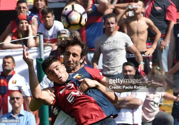 Emiliano Moretti of FC Torino and Giovanni Simeone of Genoa CFC during the Serie A match between Genoa CFC and FC Torino at Stadio Luigi Ferraris on...