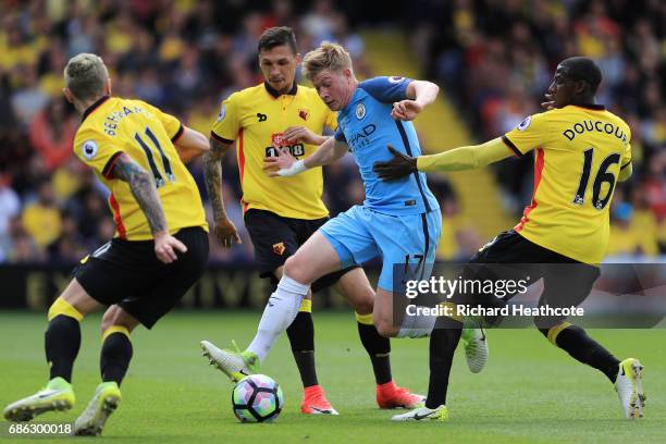 Kevin De Bruyne of Manchester City is surrounded by Watford players during the Premier League match between Watford and Manchester City at Vicarage...