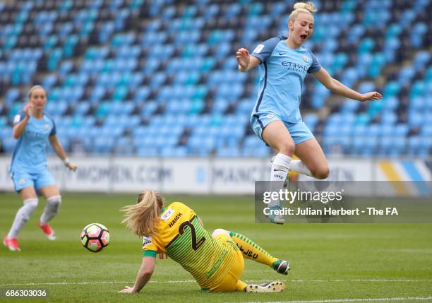 Toni Duggan of Manchester City Women avoids the tackle of Natalie Haigh of Yeovil Town Ladies during the WSL Spring Series Match between Manchester...