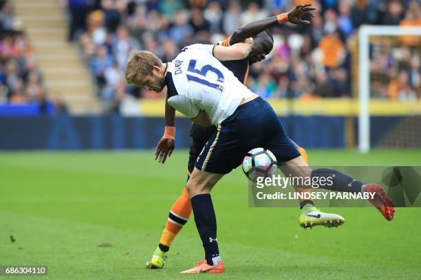 Tottenham Hotspur's English defender Eric Dier vies with Hull City's Senegalese striker Oumar Niasse during the English Premier League football match...