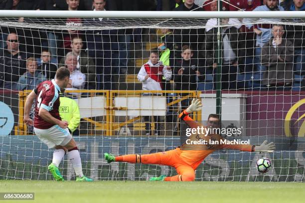 Sam Vokes of Burnley scores his sides first goal past Adrian of West Ham United during the Premier League match between Burnley and West Ham United...