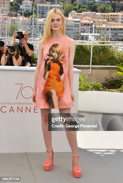 Actress Elle Fanning attends the "How To Talk To Girls At Parties" photocall during the 70th annual Cannes Film Festival at on May 21, 2017 in...