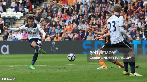 Tottenham Hotspur's English midfielder Dele Alli scores his team's third goal during the English Premier League football match between Hull City and...