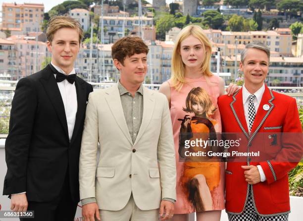 Actors AJ Lewis, Alex Sharp, Elle Fanning and director John Cameron Mitchell attend the "How To Talk To Girls At Parties" photocall during the 70th...