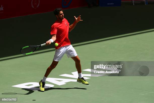 Altug Celikbilek of Turkey returns the ball to Amine Ahouda of Morocco during the Baku 2017, 4th Islamic Solidarity Games Men's Semi final tennis...