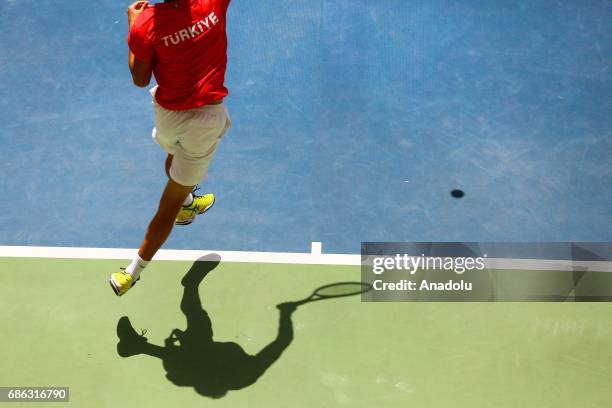 Altug Celikbilek of Turkey returns the ball to Amine Ahouda of Morocco during the Baku 2017, 4th Islamic Solidarity Games Men's Semi final tennis...