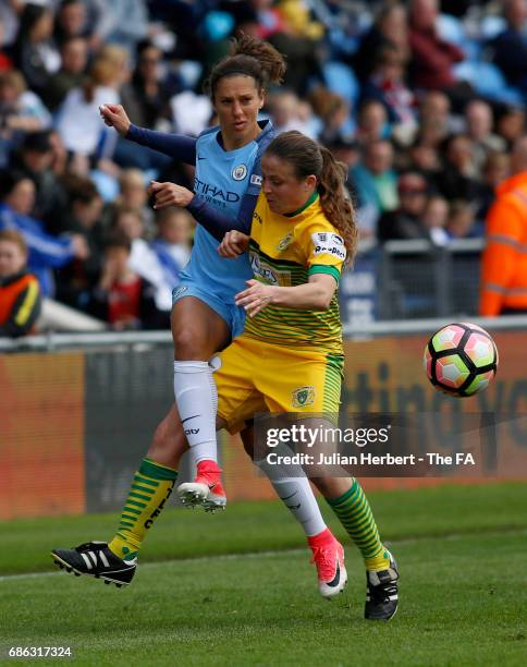 Carli Lloyd of Manchester City Women and Annie Heatherson of Yeovil Town Ladies in action during the WSL Spring Series Match between Manchester City...