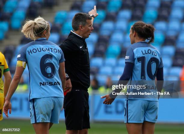 Referee Paul Graham sends off Carli Lloyd of Manchester City Women during the WSL Spring Series Match between Manchester City Women and Yeovil Town...