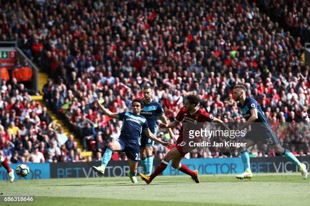 Adam Lallana of Liverpool scores his sides third goal during the Premier League match between Liverpool and Middlesbrough at Anfield on May 21, 2017...