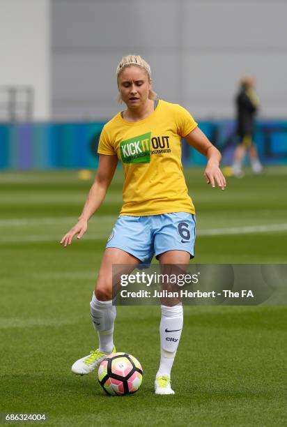 Steph Houghton of Manchester City Women warms up in A Kick It Out shirt before the WSL Spring Series Match between Manchester City Women and Yeovil...