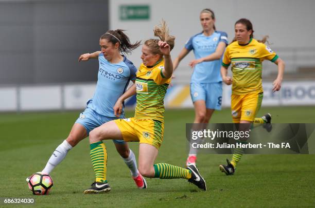 Lucy Bronze of Manchester City Women and Natalie Haigh of Yeovil Town Ladies in action during the WSL Spring Series Match between Manchester City...