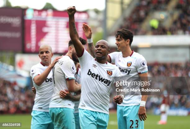 Andre Ayew o West Ham United celebrates scoring his sides second goal during the Premier League match between Burnley and West Ham United at Turf...