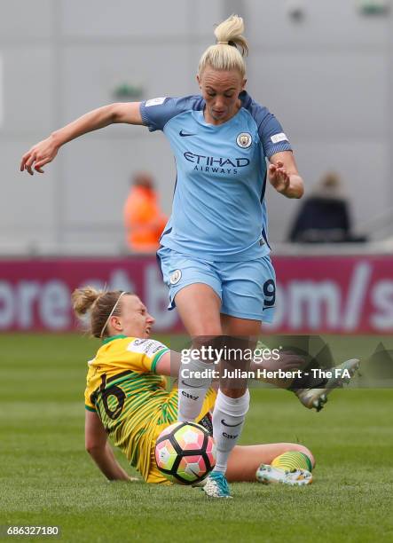 Toni Duggan of Manchester City Women avoids the tackle of Natalie Haigh of Yeovil Town Ladies during the WSL Spring Series Match between Manchester...