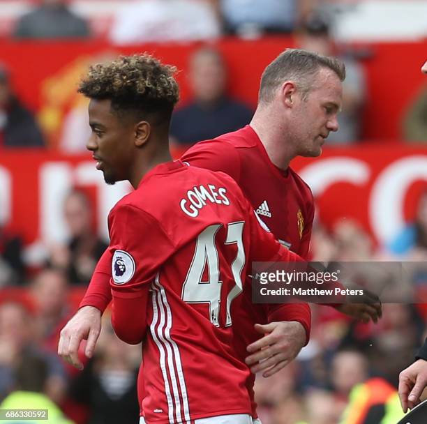 Wayne Rooney of Manchester United is replaced by Angel Gomes during the Premier League match between Manchester United and Crystal Palace at Old...