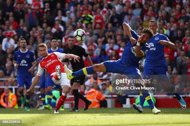 Aaron Ramsey of Arsenal scores his sides third goal during the Premier League match between Arsenal and Everton at Emirates Stadium on May 21, 2017...