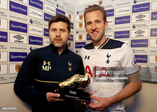 Harry Kane of Tottenham Hotspur stands with his manager Mauricio Pochettino after he is awarded the golden boot following the Premier League match...