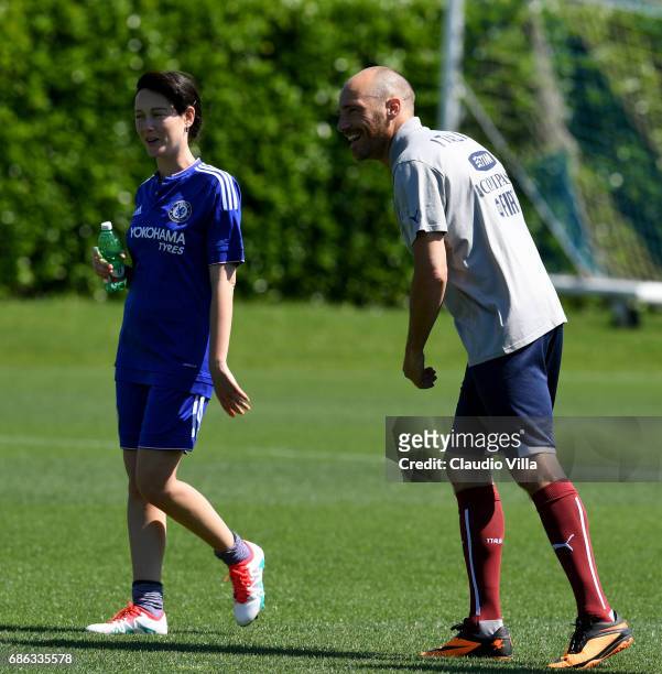 Cristiana Capotondi and Andrea Pezzi look on during a friendly match during the Italian Football Federation Kick Off Seminar on May 21, 2017 in...