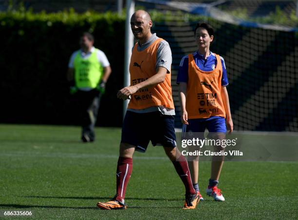 Cristiana Capotondi and Andrea Pezzi look on during a friendly match during the Italian Football Federation Kick Off Seminar on May 21, 2017 in...