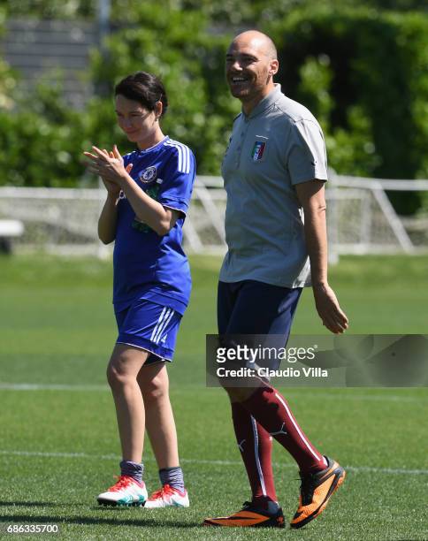 Cristiana Capotondi and Andrea Pezzi smile during a friendly match during the Italian Football Federation Kick Off Seminar on May 21, 2017 in...