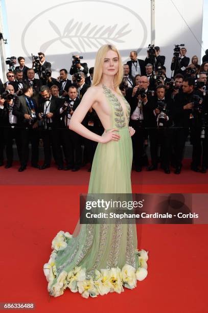 Actress Elle Fanning departs after the "How To Talk To Girls At Parties" screening during the 70th annual Cannes Film Festival at Palais des...