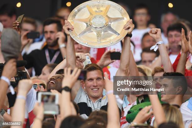 Hannes Wolf, head coach of Stuttgart celebrates winning the 2. Second Bundesliga Championship title with the Championship trophy after the 2. Second...