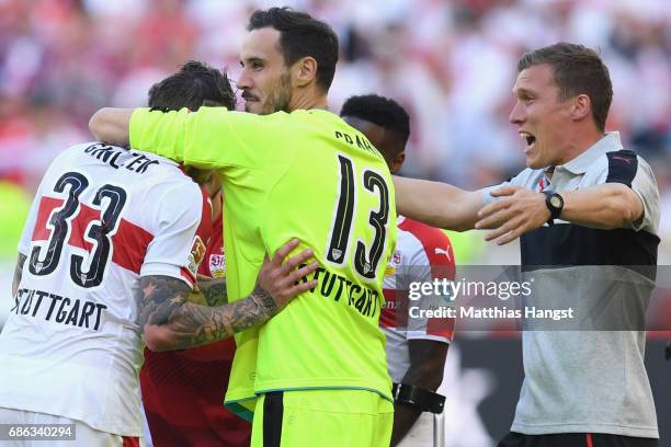 Hannes Wolf, head coach of Stuttgart celebrates winning the 2. Second Bundesliga Championship title with his players Mitchell Langerak and Daniel...