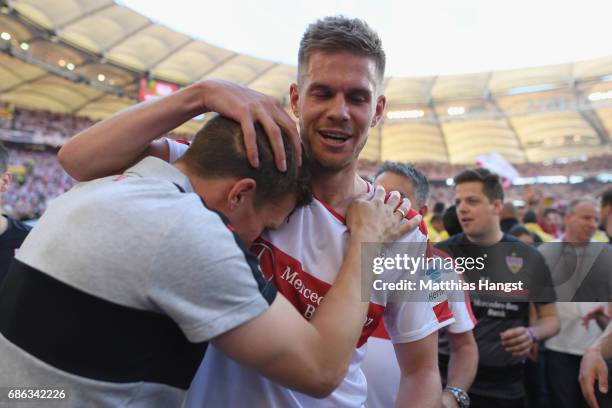Hannes Wolf, head coach of Stuttgart celebrates winning the 2. Second Bundesliga Championship title with his player Simon Terodde after the 2. Second...
