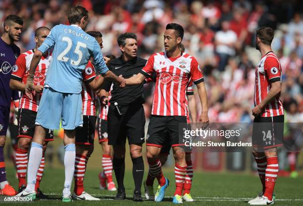 Maya Yoshida of Southampton and Peter Crouch of Stoke City shake hands during the Premier League match between Southampton and Stoke City at St...