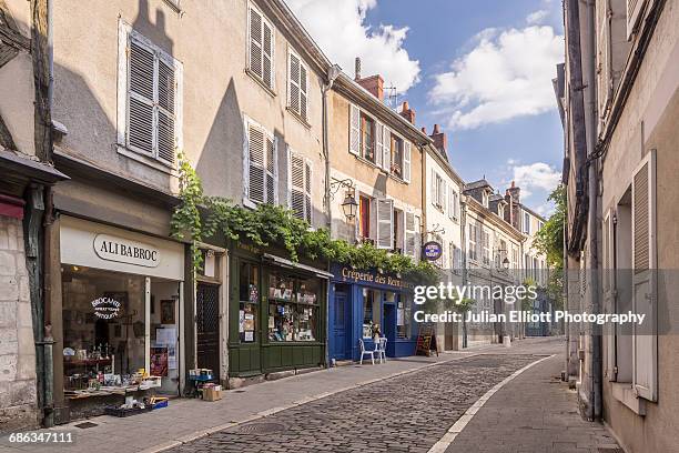 rue bourbonnoux in bourges, france. - shop sign stock pictures, royalty-free photos & images