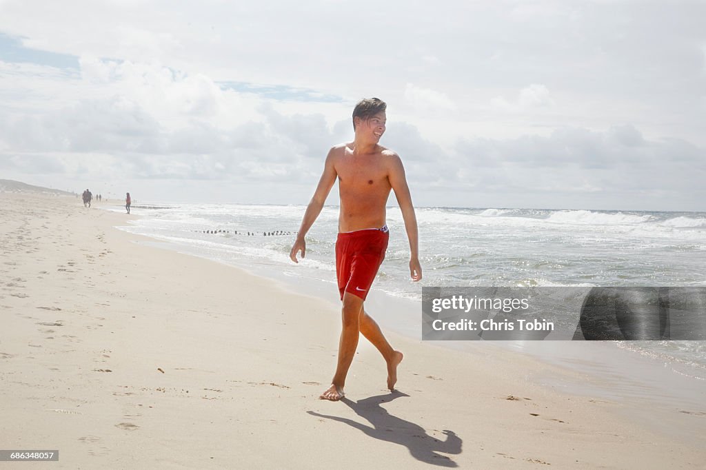 Teenage boy on the beach