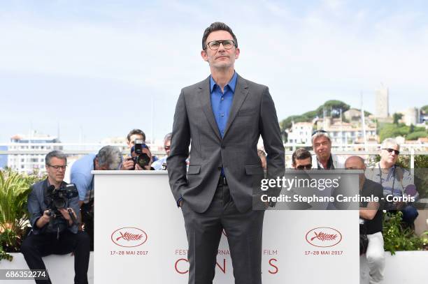 Director Michel Hazanavicius attends the "Redoubtable " photocall during the 70th annual Cannes Film Festival at Palais des Festivals on May 21, 2017...
