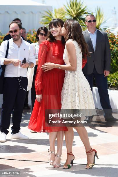 Actresses Stacy Martin and Berenice Bejo attend the "Redoubtable " photocall during the 70th annual Cannes Film Festival at Palais des Festivals on...