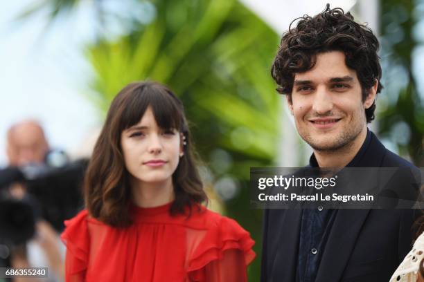 Louis Garrel and Stacy Martin attend the "Redoubtable " photocall during the 70th annual Cannes Film Festival at Palais des Festivals on May 21, 2017...