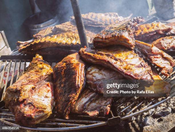 meat on the grill - smokey bacon stock pictures, royalty-free photos & images