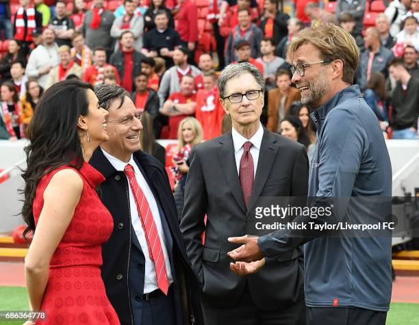 Tom Werner Chairman of Liverpool poses with Jurgen Klopp manager of Liverpool and John W Henry Principal owner with wife Linda Pizzuti at the end of...