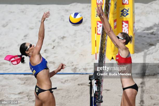 Agatha Bednarczuk of Brazil spikes the ball during the Women's Finals match against Sarah Pavan and Melissa Humana-Paredes of Canada of Brazil at...