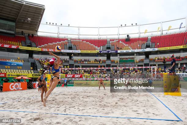 Agatha Bednarczuk of Brazil spikes the ball during the Women's Finals match against Sarah Pavan and Melissa Humana-Paredes of Canada of Brazil at...