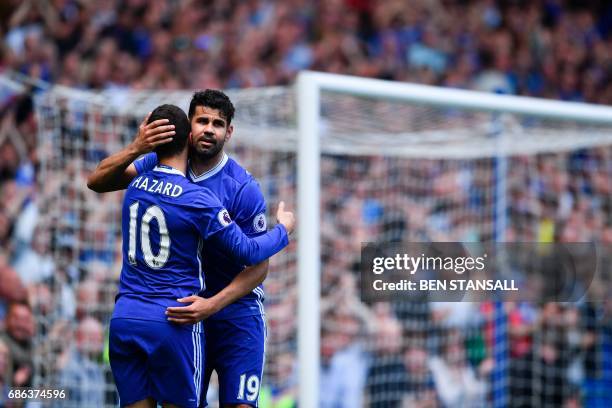 Chelsea's Belgian midfielder Eden Hazard emabraces Chelsea's Brazilian-born Spanish striker Diego Costa after scoring their second goal during the...