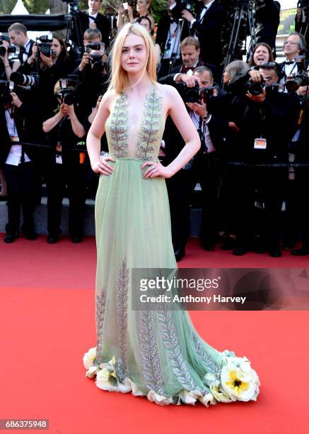 Actress Elle Fanning departs after the "How To Talk To Girls At Parties" screening during the 70th annual Cannes Film Festival at Palais des...