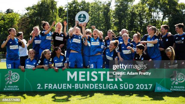 Johanna Kaiser of Hoffenheim II and her team mates celebrating with the 2. Bundesliga Womens trophy after victory in the match between 1899...