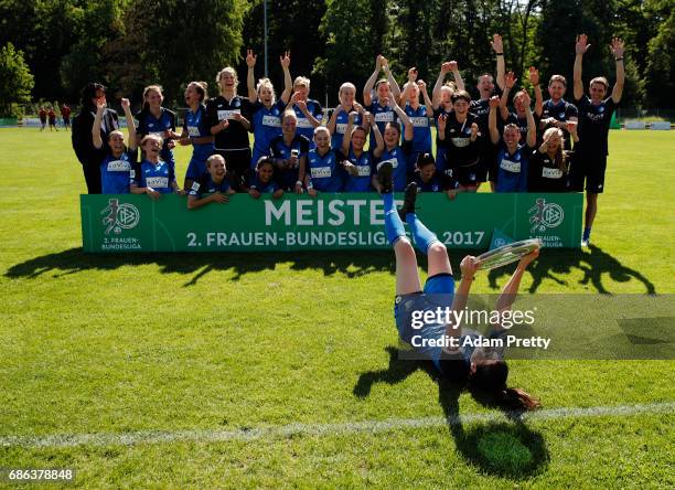 Johanna Kaiser of Hoffenheim II and her team mates celebratw with the 2. Bundesliga Womens trophy after victory in the match between 1899 Hoffenheim...