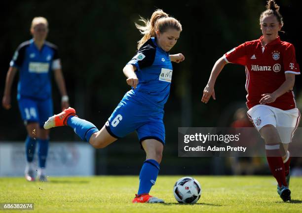 Alicia Schinko of Hoffenheim II is challenged by Melanie Keunrath of FC Bayern Munich II during the match between 1899 Hoffenheim II and FCB Muenchen...