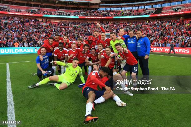 The York City team celebrate after The Buildbase FA Trophy Final between York City and Macclesfield Town at Wembley Stadium on May 21, 2017 in...