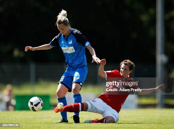 Jana Beuschlein of Hoffenheim II is challenged by Anja Pfluger of FC Bayern Munich II during the match between 1899 Hoffenheim II and FCB Muenchen II...