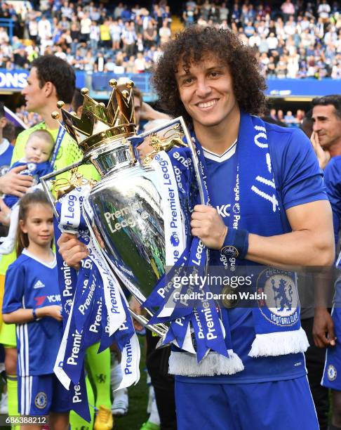 David Luiz of Chelsea poses with the Preimer League Trophy after the Premier League match between Chelsea and Sunderland at Stamford Bridge on May...