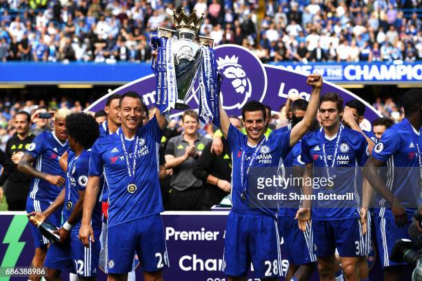 John Terry of Chelsea and Cesar Azpilicueta of Chelsea lift the Premier Leauge Trophy after the Premier League match between Chelsea and Sunderland...